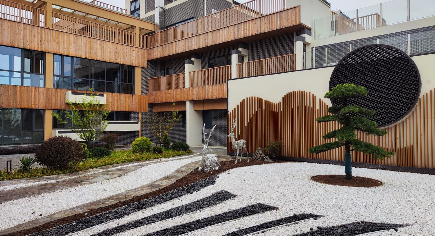 A tranquil modern courtyard with garden elements