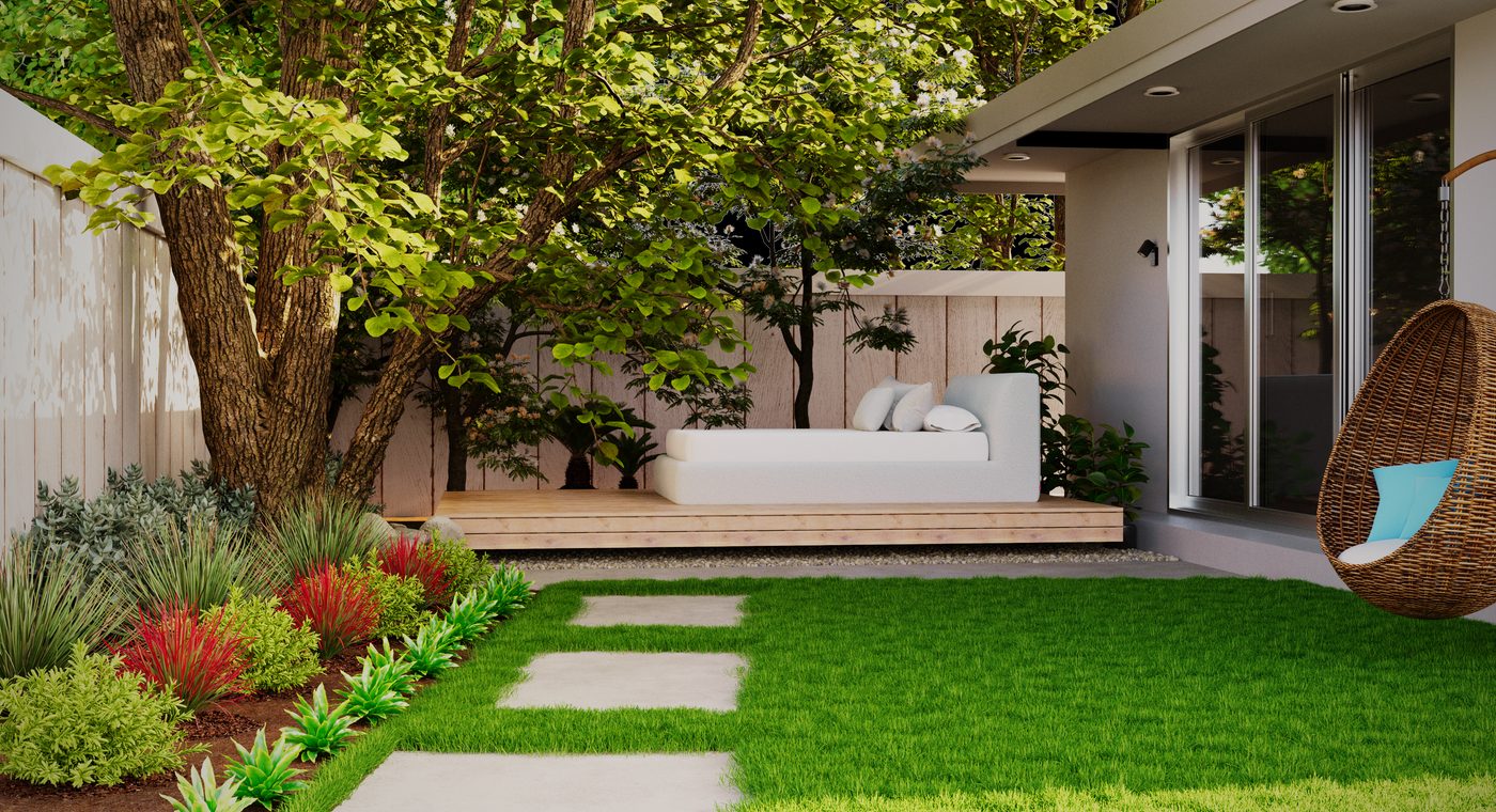 Minimal patio seating framed by green planting